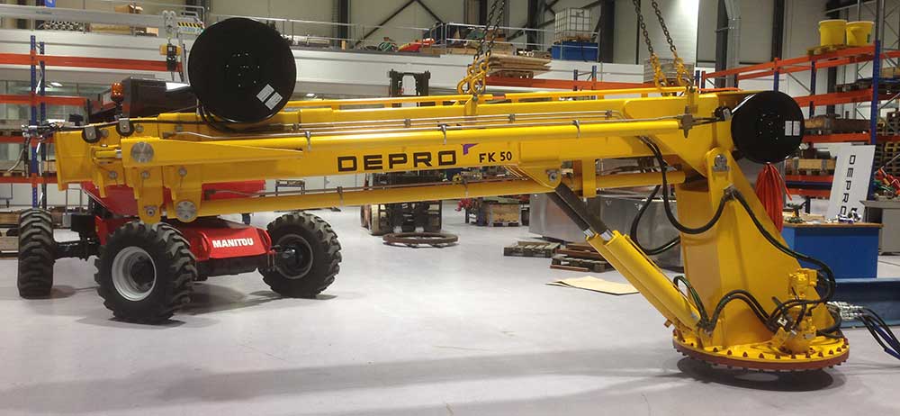 New telescopic crane standing on the floor in Depro's workshop hall ready for testing.