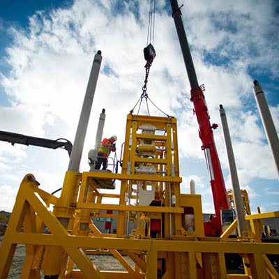 Depro_400 The world's largest Clamp connector is put together outside the Depro building using a crane truck.